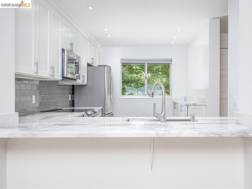 Discover an exceptional 2-bedroom, 2-bathroom residence where - photo 5