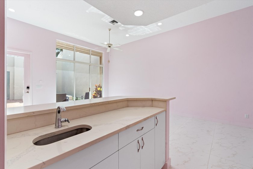 This beautifully renovated 2-bedroom, 2.5-bath townhome offers a - photo 14