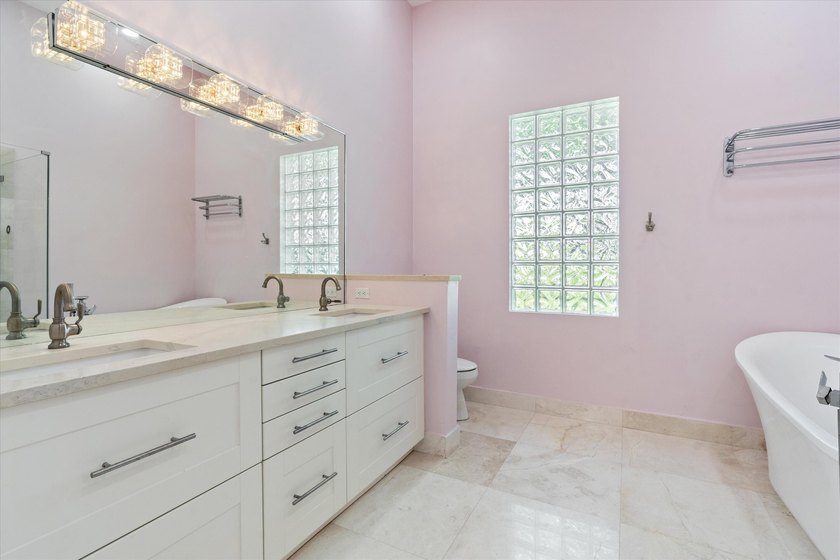This beautifully renovated 2-bedroom, 2.5-bath townhome offers a - photo 20