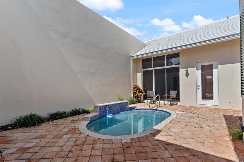 This beautifully renovated 2-bedroom, 2.5-bath townhome offers a - photo 26