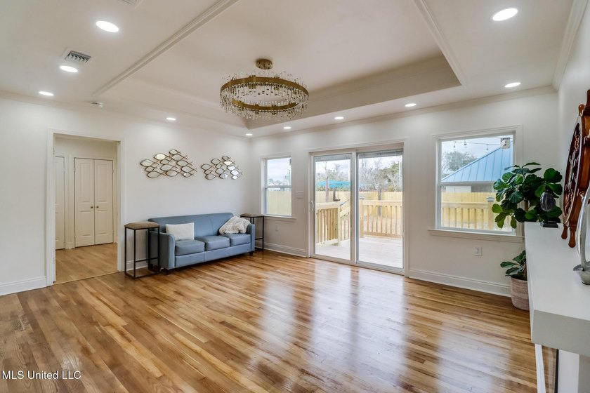 Taken down to the studs and completely rebuilt, this home offers - photo 2