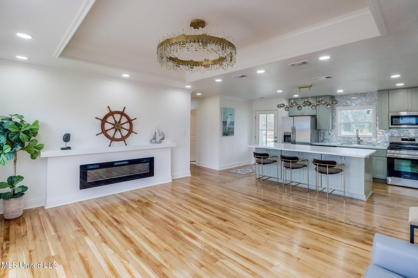 Taken down to the studs and completely rebuilt, this home offers - photo 3