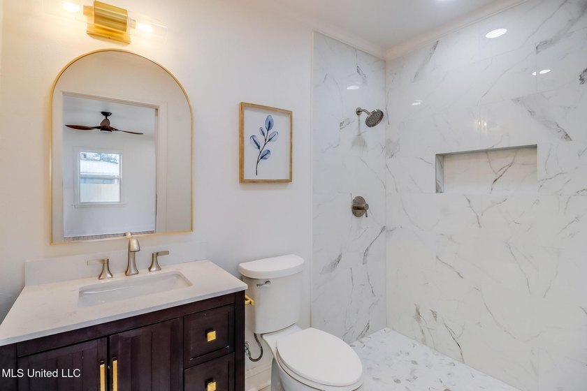 Taken down to the studs and completely rebuilt, this home offers - photo 9