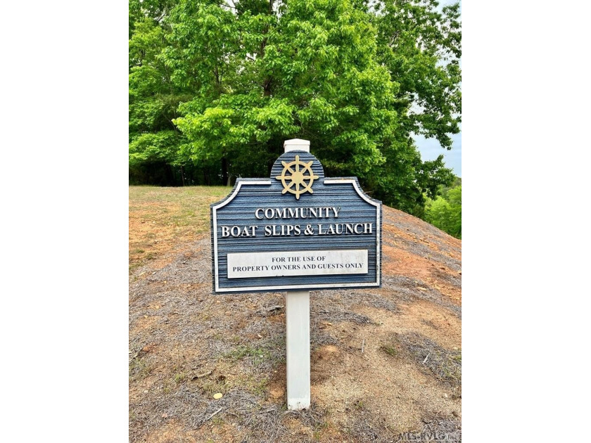 Tucked within the gates of Harbor Landing, Lot 67 offers just - photo 9