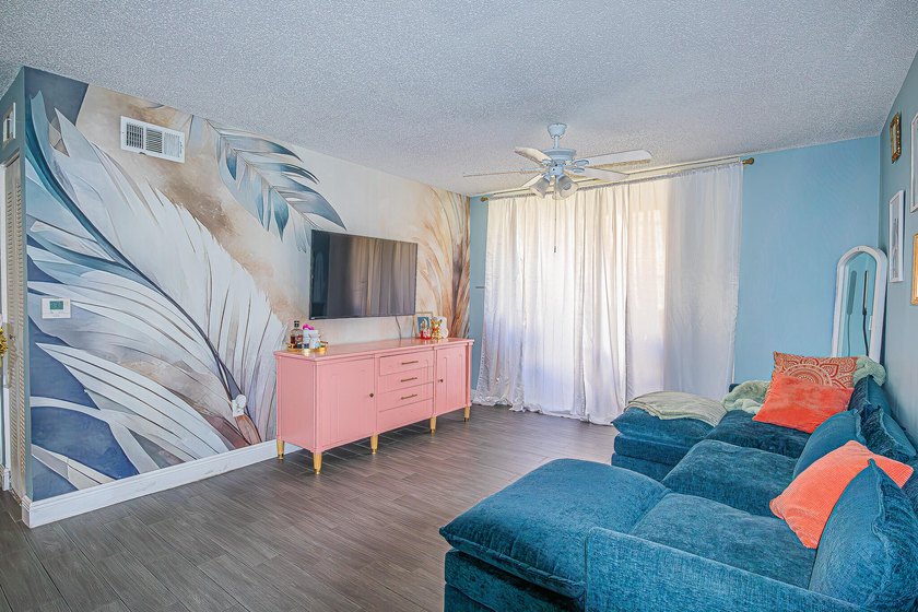 Step into this updated first-floor condo perfectly situated in - photo 4