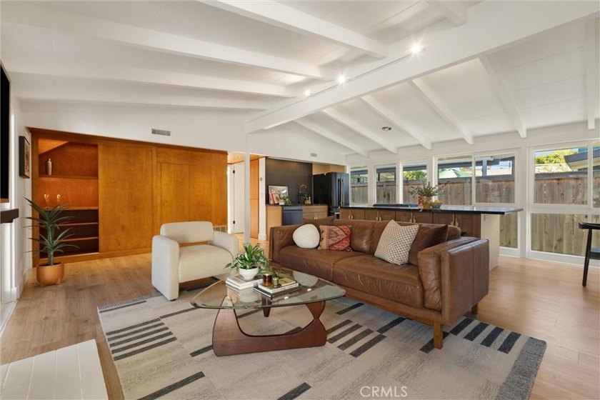 Welcome to this beautifully updated 4-bedroom, 2-bath Cliff May - photo 2