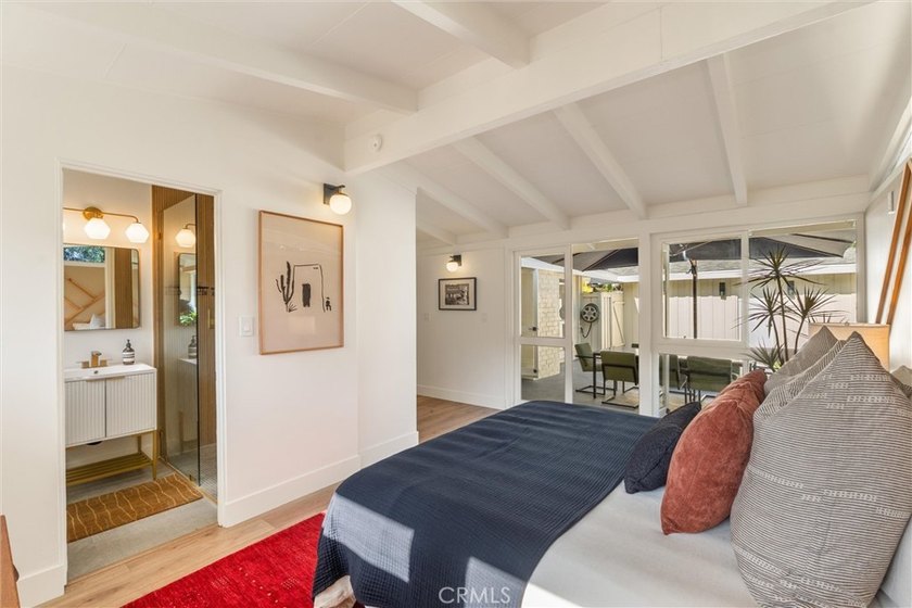 Welcome to this beautifully updated 4-bedroom, 2-bath Cliff May - photo 4