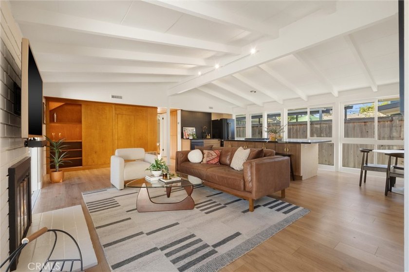 Welcome to this beautifully updated 4-bedroom, 2-bath Cliff May - photo 8