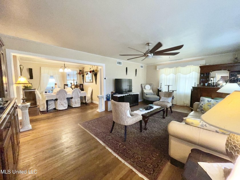 This charming home is a spacious five-bedroom, two full bath - photo 4
