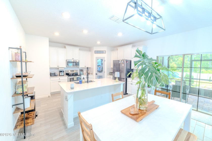 Open House July 12th 11am-3pm! Own $63,000 in paid-off upgrades: - photo 12