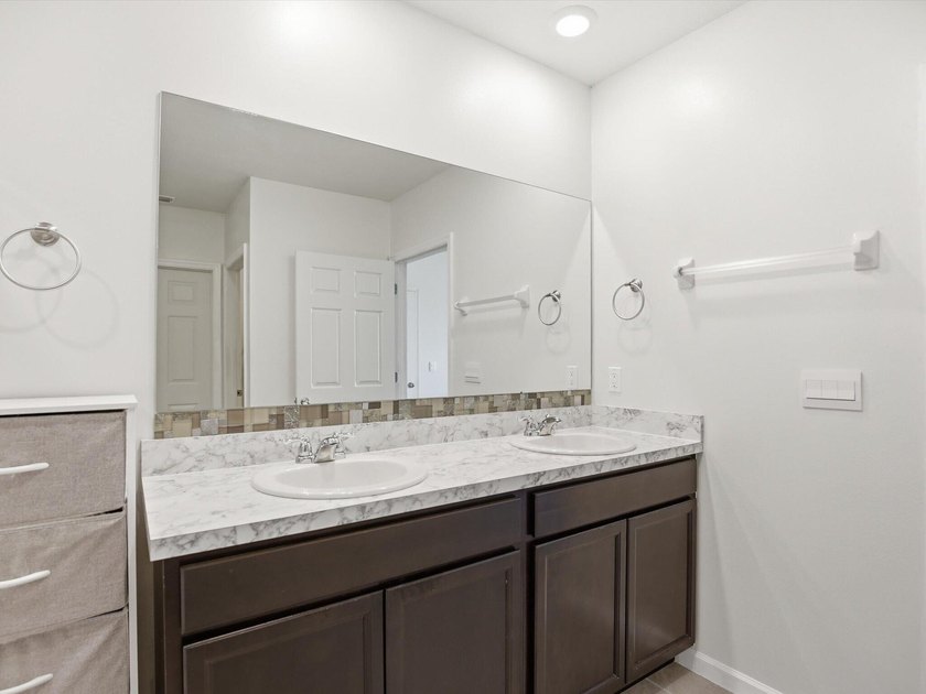 Well-maintained 4-bedroom, 2-bath home in the growing Creekside - photo 15