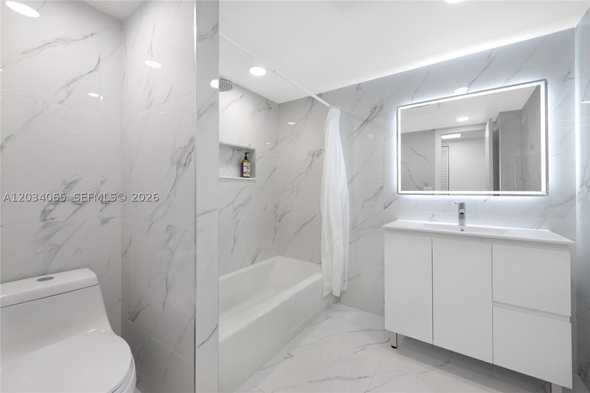 Newly renovated 2-bed, 2-bath condo offering 1,517 SF of - photo 16