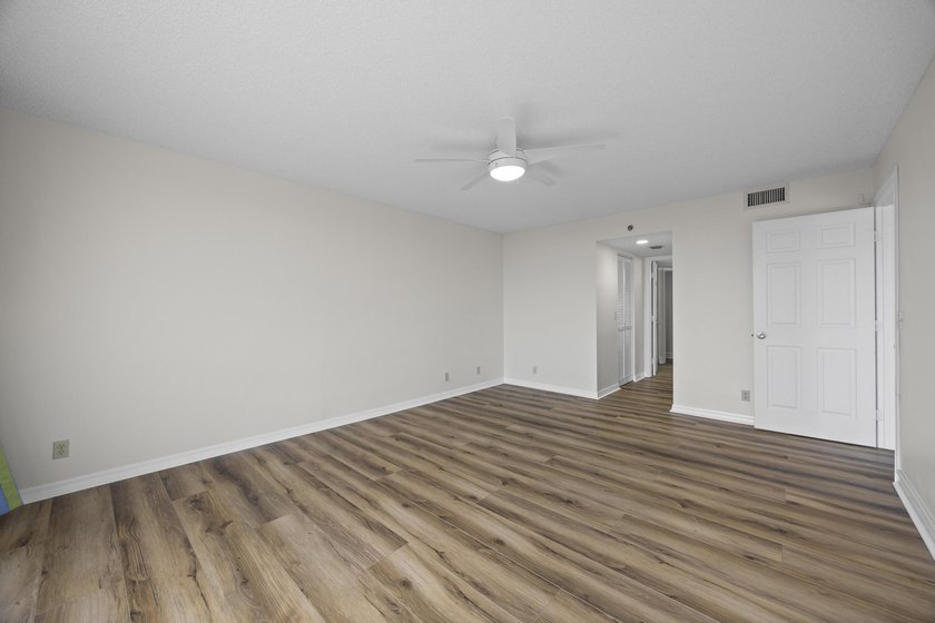 RARE 3 BEDROOM/2BATH CORNER UNIT WITH TWO GARAGES! Step inside - photo 14