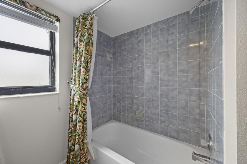 RARE 3 BEDROOM/2BATH CORNER UNIT WITH TWO GARAGES! Step inside - photo 22