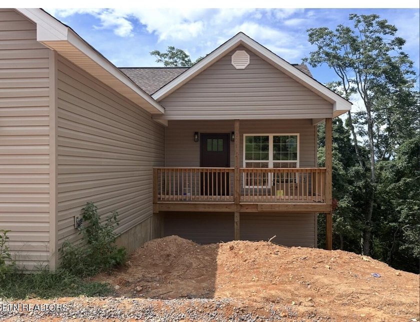 Perched on 1.36 private hillside acres with stunning views, this - photo 3