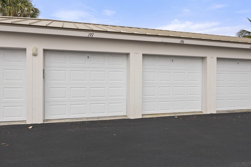 RARE 3 BEDROOM/2BATH CORNER UNIT WITH TWO GARAGES! Step inside - photo 32