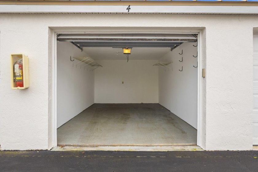 RARE 3 BEDROOM/2BATH CORNER UNIT WITH TWO GARAGES! Step inside - photo 35