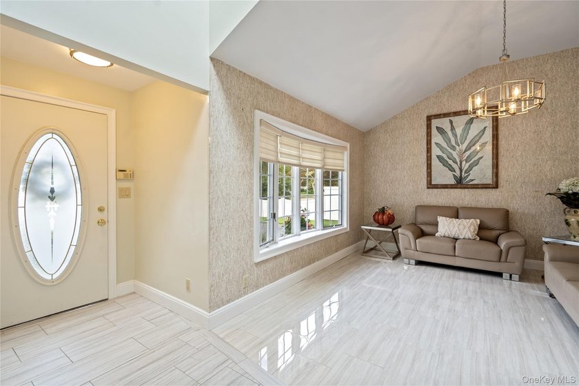 Welcome home to 939 Manor Lane in Bay Shore. This meticulously - photo 13