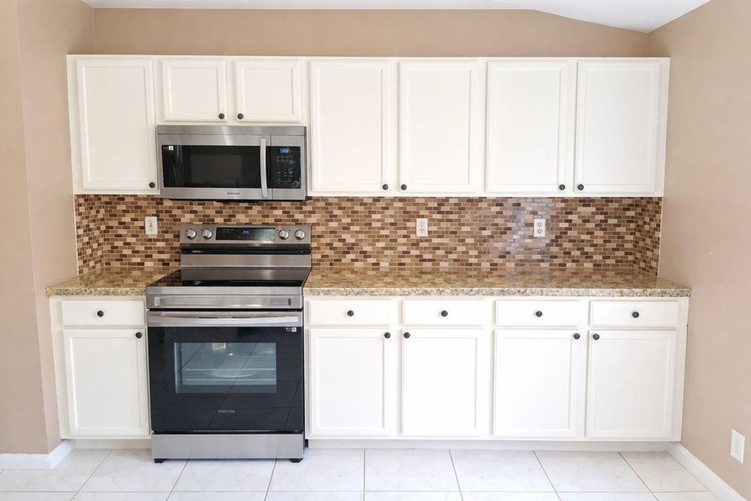 Step into this beautifully maintained home packed with valuable - photo 7