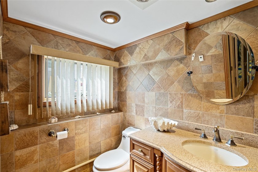 Welcome home to 939 Manor Lane in Bay Shore. This meticulously - photo 32