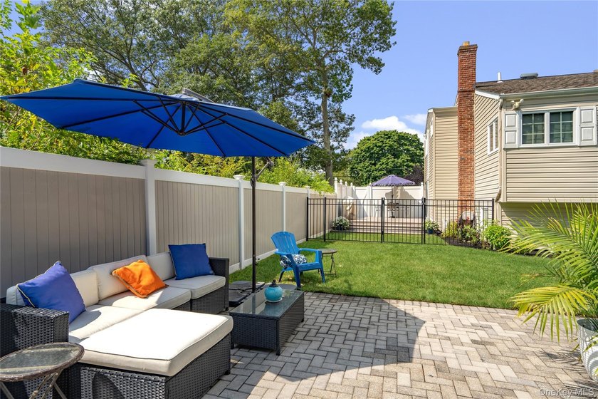 Welcome home to 939 Manor Lane in Bay Shore. This meticulously - photo 40