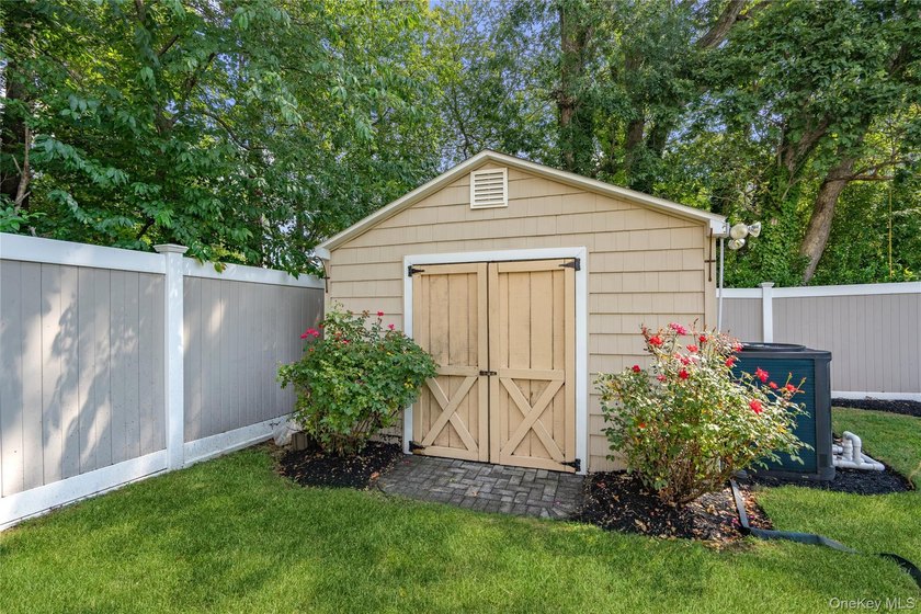 Welcome home to 939 Manor Lane in Bay Shore. This meticulously - photo 42