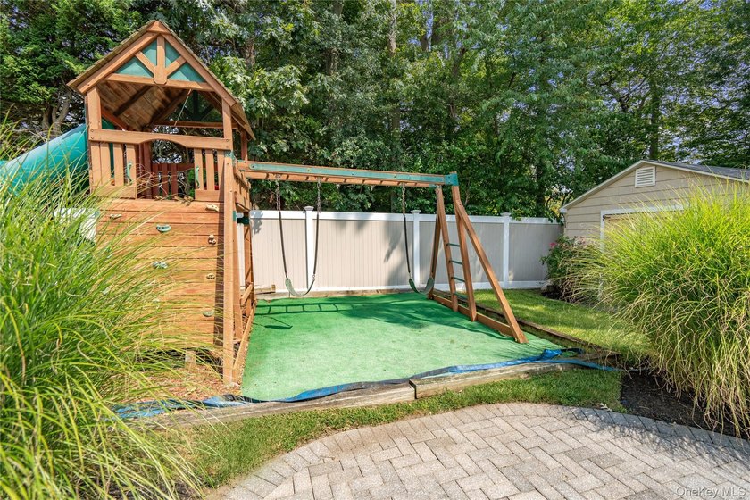 Welcome home to 939 Manor Lane in Bay Shore. This meticulously - photo 43