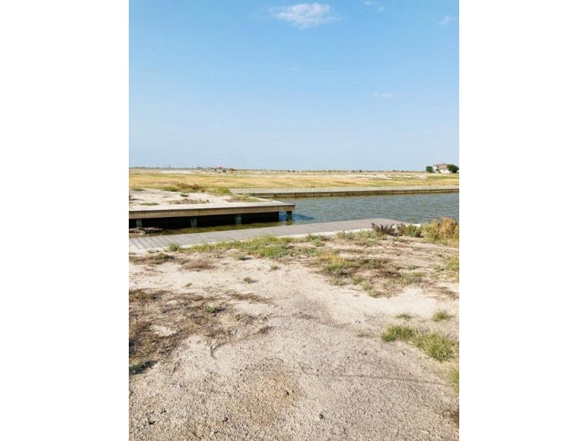 Builders dream lot. This approximate 83 x 262 canal front lot is - photo 9