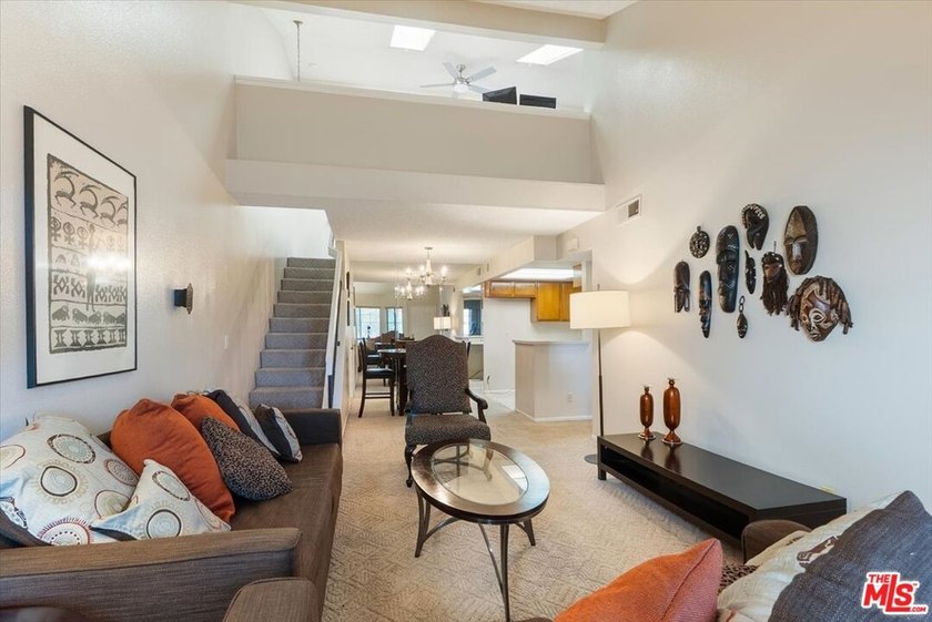 Welcome to this spacious two-story townhome-style condo in the - photo 5