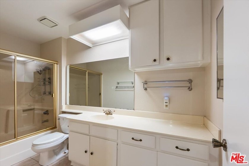 Welcome to this spacious two-story townhome-style condo in the - photo 9