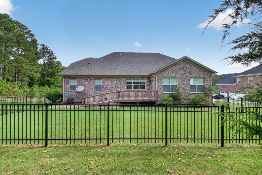 Situated on a generously sized golf course lot in Mount Vintage - photo 22