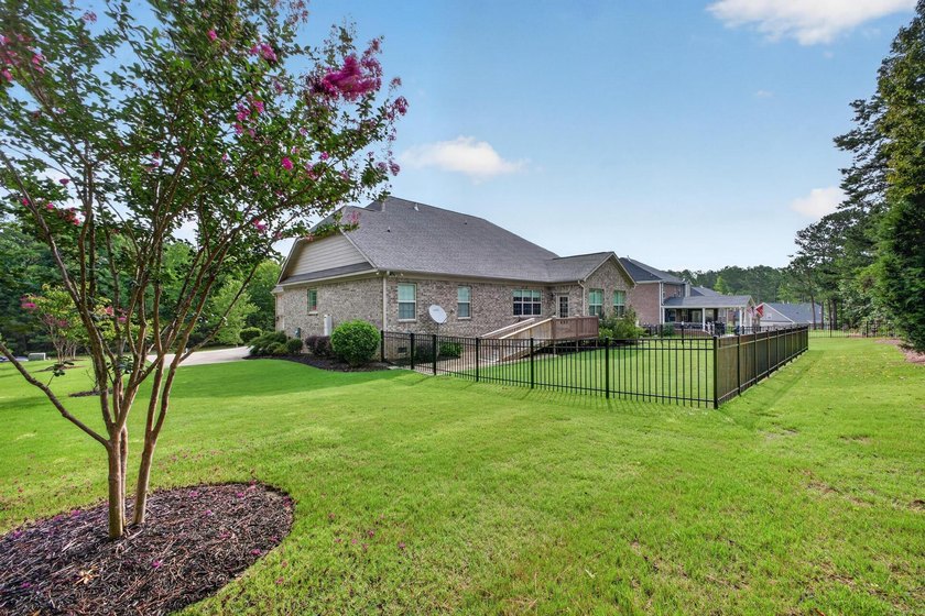Situated on a generously sized golf course lot in Mount Vintage - photo 24