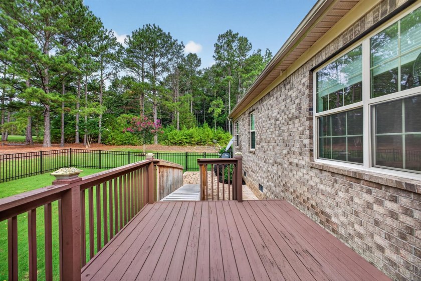 Situated on a generously sized golf course lot in Mount Vintage - photo 27