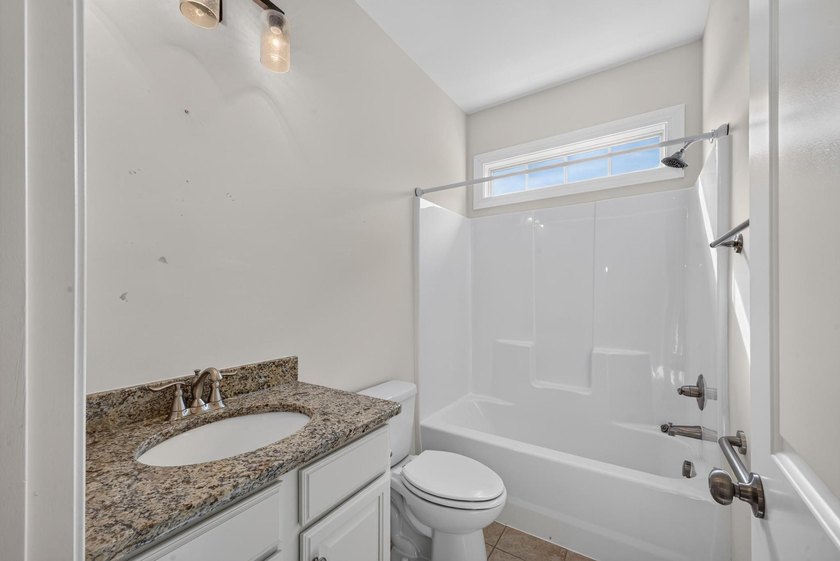 Situated on a generously sized golf course lot in Mount Vintage - photo 30