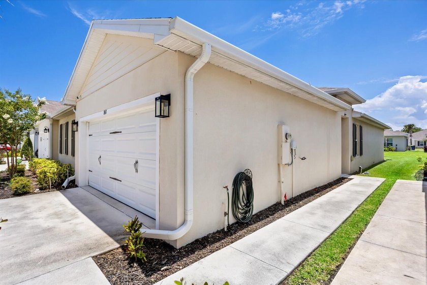 Welcome to this charming 3-bedroom, 2-bath villa in Avalon - photo 2