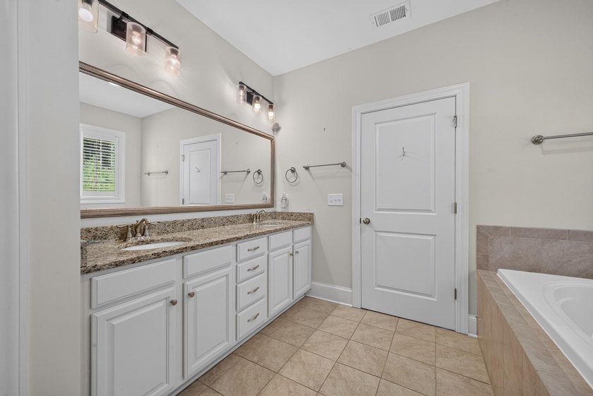 Situated on a generously sized golf course lot in Mount Vintage - photo 45