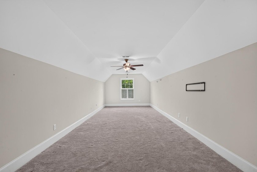 Situated on a generously sized golf course lot in Mount Vintage - photo 47