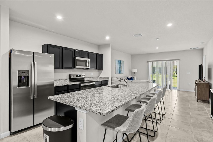 Welcome to this charming 3-bedroom, 2-bath villa in Avalon - photo 9