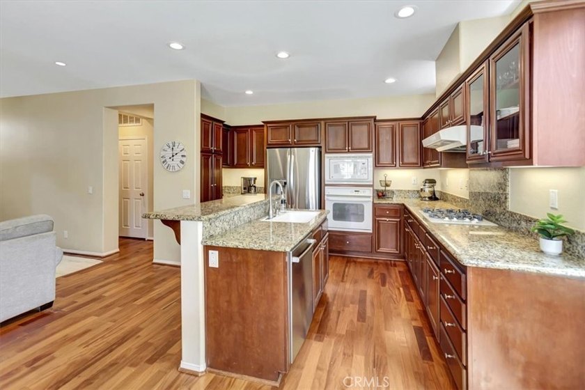 Wake up to peaceful park views in this beautifully maintained - photo 12