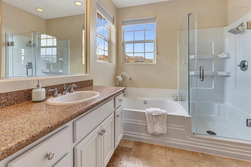 Wake up to peaceful park views in this beautifully maintained - photo 16