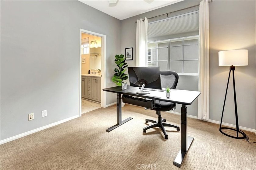 Wake up to peaceful park views in this beautifully maintained - photo 19