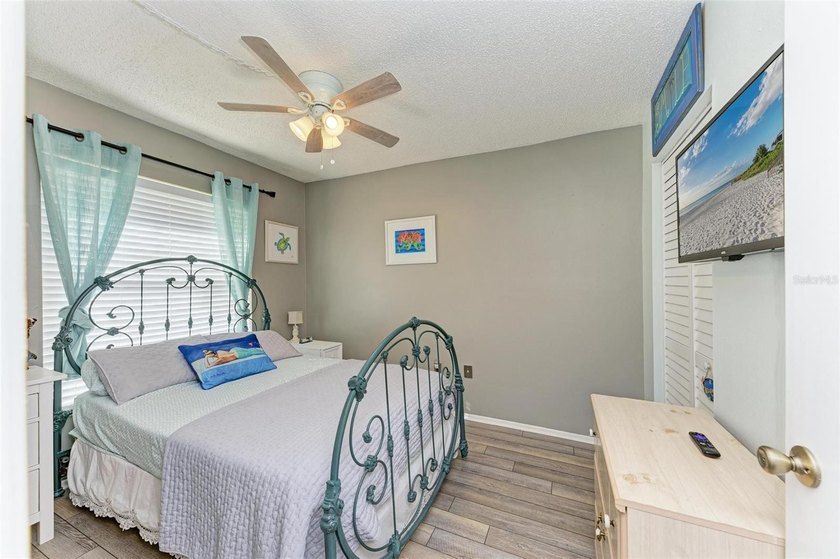 Welcome to this spacious 3-bedroom, 2-bathroom condo in the - photo 22