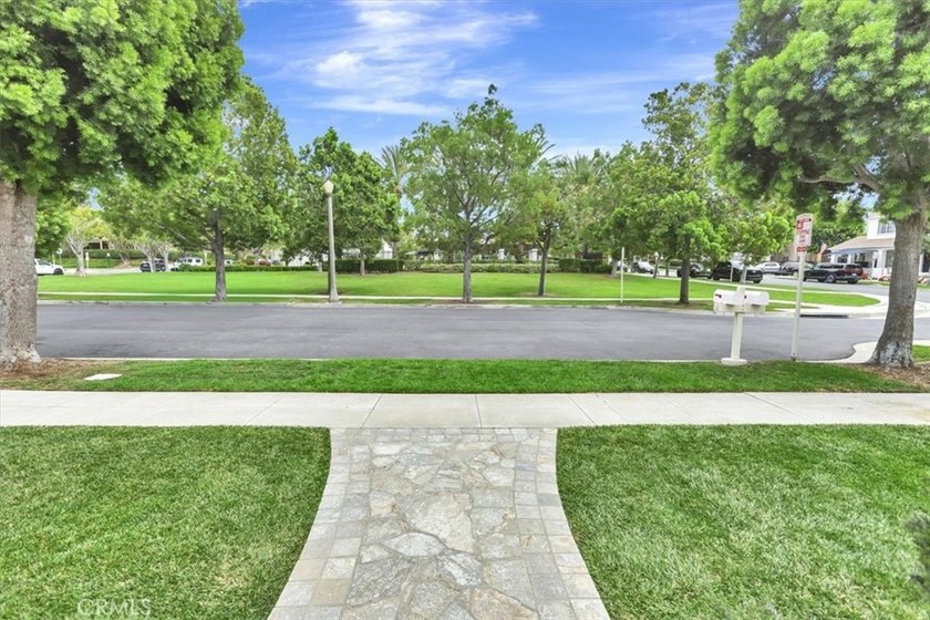 Wake up to peaceful park views in this beautifully maintained - photo 28