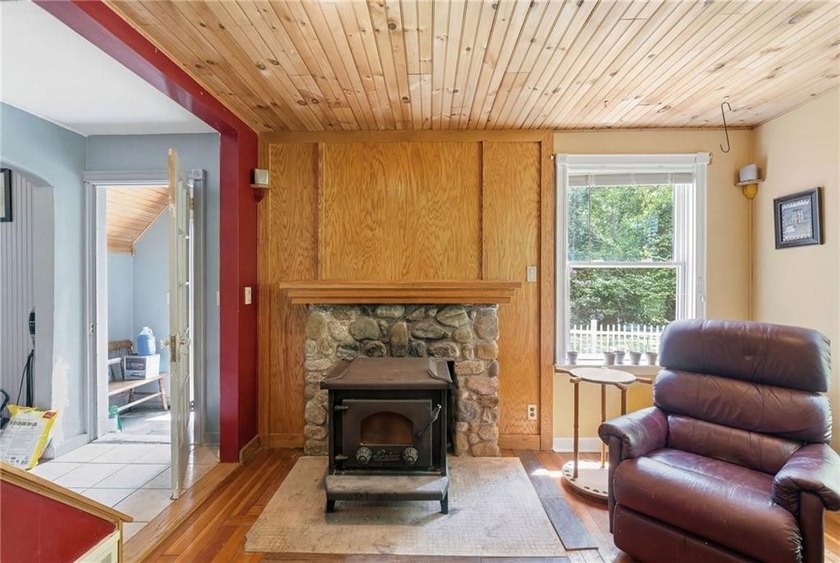 Set on nearly an acre in North Kingstown, this 3-bedroom, 1-bath - photo 15
