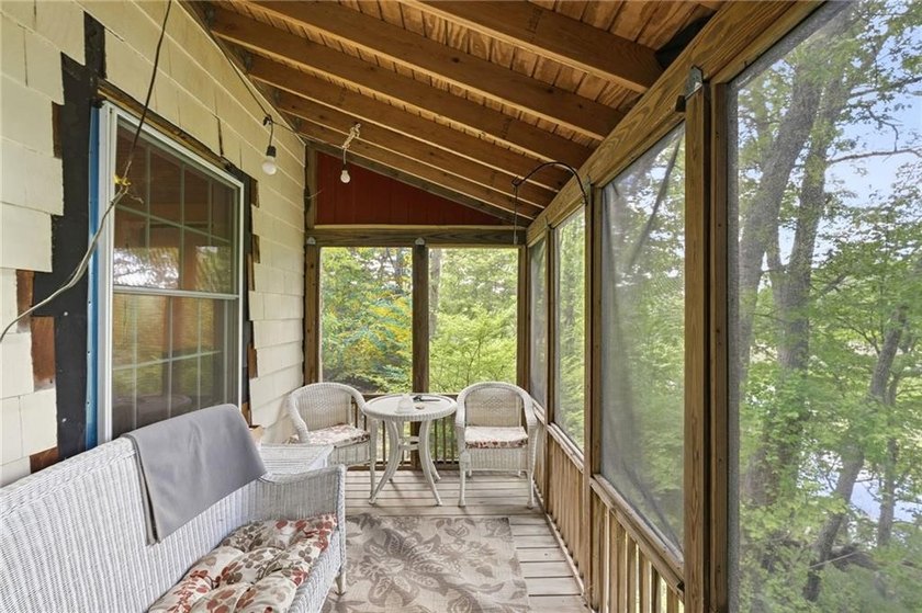 Set on nearly an acre in North Kingstown, this 3-bedroom, 1-bath - photo 18
