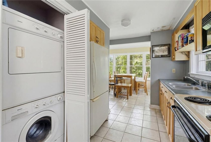 Set on nearly an acre in North Kingstown, this 3-bedroom, 1-bath - photo 22