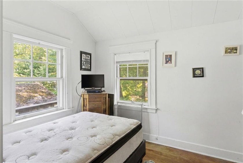 Set on nearly an acre in North Kingstown, this 3-bedroom, 1-bath - photo 24