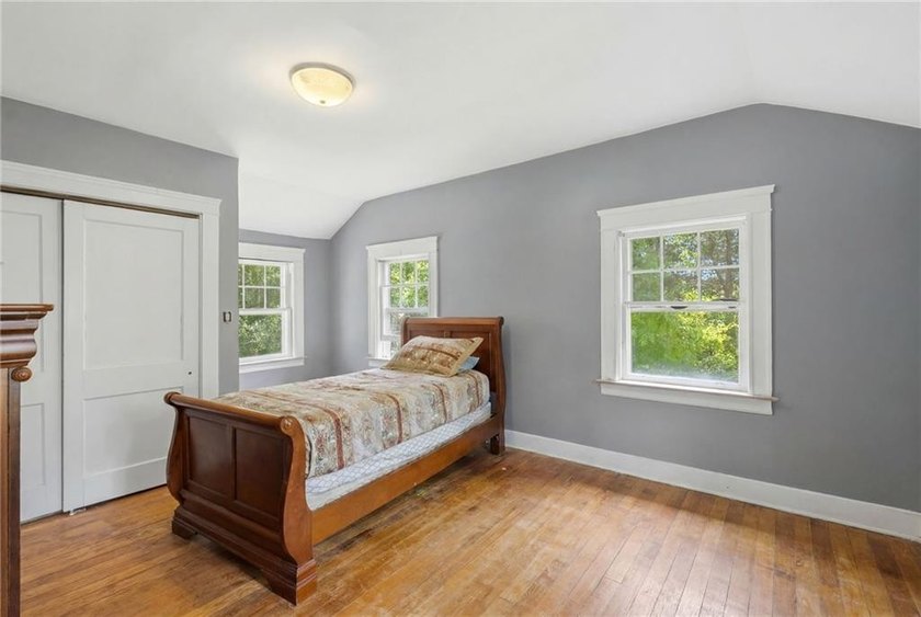 Set on nearly an acre in North Kingstown, this 3-bedroom, 1-bath - photo 25