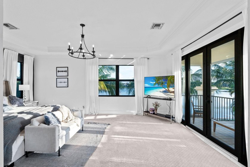 Beyond double entry doors, a remodeled iron staircase frames - photo 29