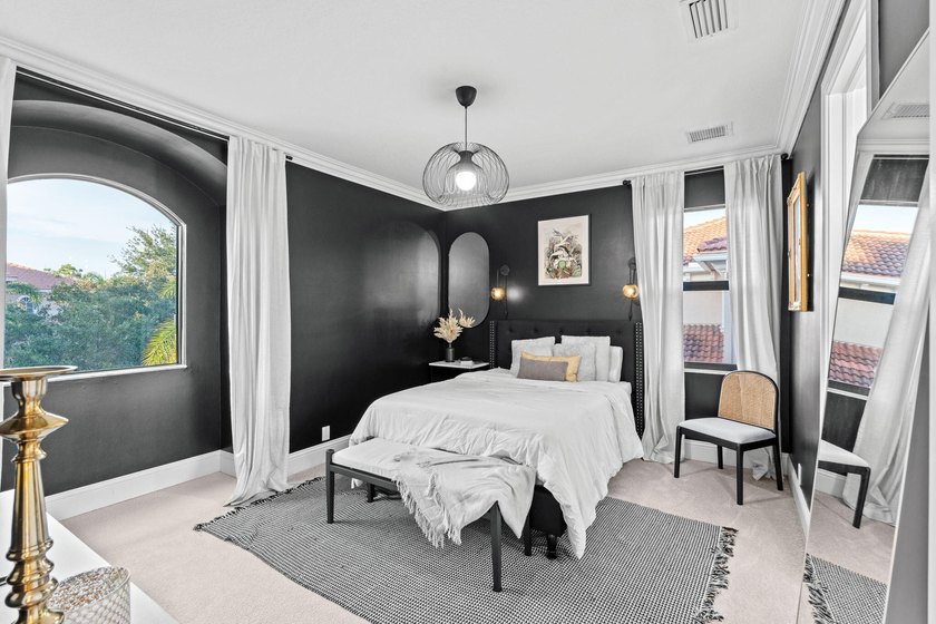 Beyond double entry doors, a remodeled iron staircase frames - photo 39